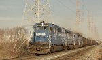 CR 6507 leads an empty coal train west past the Waterworks facility